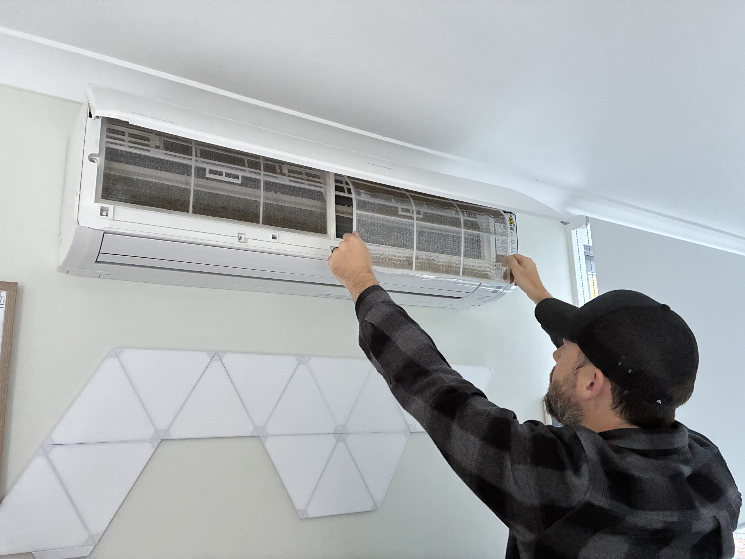 Removing AC filters to clean