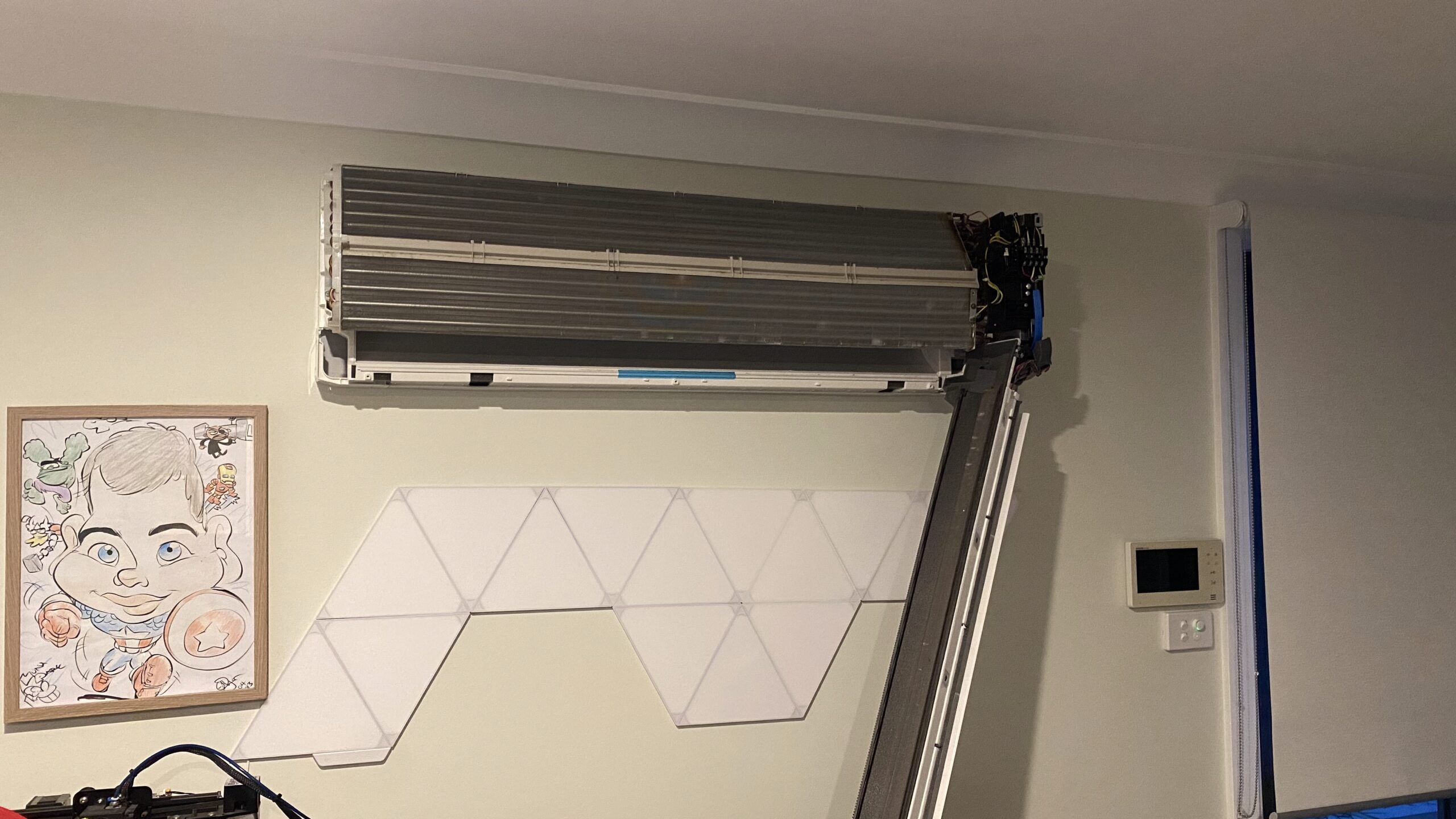 An air conditioner pulled apart for a deep clean